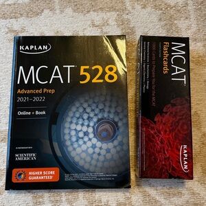 Kaplan MCAT 528 Advanced Prep Book in Black and Orange